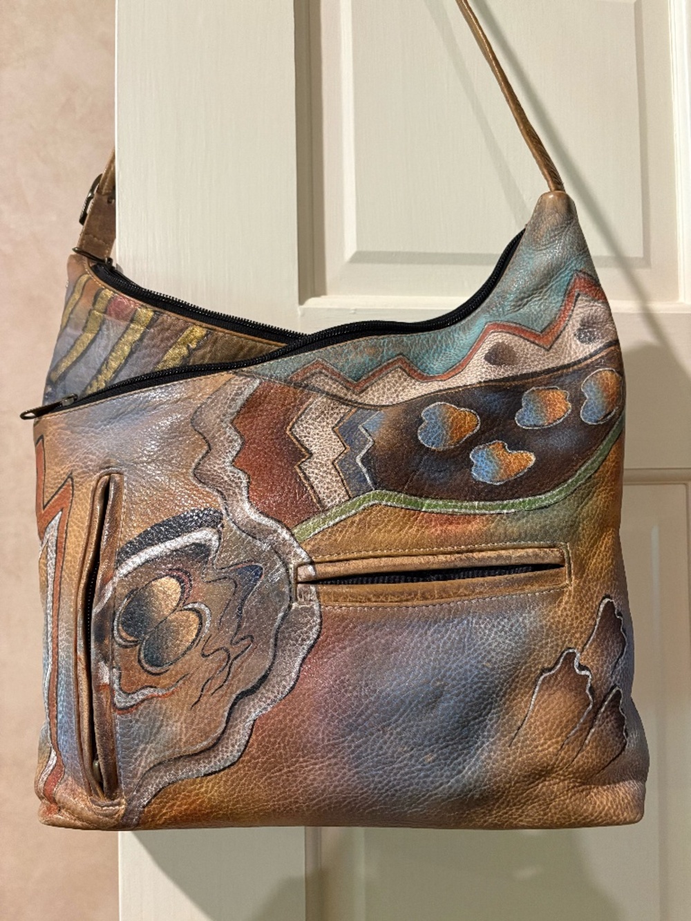 Unusual style, vintage Anuschka handbag.
